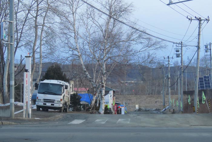 webnews今朝の北見/交差点から奥が無加川の右岸堤防